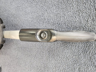 A Used Simplicity S10CV Cordless Vacuum cleaner with a handle on it.