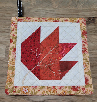 1000-Education's Beginner's Machine Embroidery class (3rd Monday monthly, 4-6 pm) is perfect for learning to create quilted square potholders with patchwork leaf designs—great for adding a handmade touch to your projects.