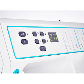 Close-up of the PFAFF Smarter By Pfaff 260c computerized sewing machine’s control panel, showing buttons, a digital display reading “29,” and multiple stitch selection options.