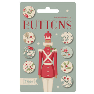 A "BUTTONS" card from Fabric by Tilda displays a soldier illustration and includes 8 festive 0.63-inch buttons from the Merry Little Christmas collection, each featuring charming holiday-themed patterns.