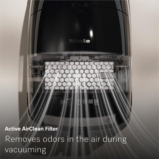 Close-up of the 2-Miele Guard M1 Cat & Dog bagged canister vacuum cleaner, featuring the Active AirClean filter with air flow lines, showcasing its excellent odor removal and pet-hair cleaning capabilities in action.