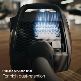 Close-up of the 2-Miele Boost CX1 Cat & Dog vacuum cleaner’s Hygiene AirClean filter with blue airflow lines, emphasizing its high dust retention and efficient removal of pet hair.