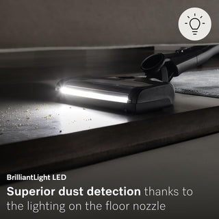 The Miele Triflex HX2 Pro 3-in-1 Cordless Stick Vacuum by Miele features an LED-lit nozzle that illuminates dust on your floors, showcasing its advanced dust detection capability and convenient 3-in-1 versatility.