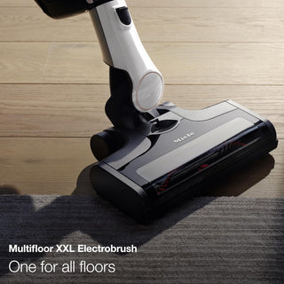 The Sew & Vac Miele TriFlex Lotus White with a Digital Efficiency Motor and multifloor XXL electrobrush effortlessly transitions from hardwood to rug, making it perfect for all floor types.