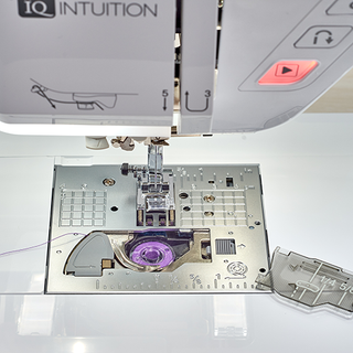 An image of a 37-Baby Lock Altair 2 Sewing & Embroidery Machine with a needle attached to it.