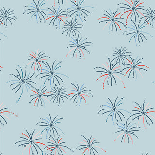 AGF Studio Bloomin' Americana BAM-47112 BOOM & BLOOM Fabric by 69-Art Gallery Fabrics features red, blue, and navy stylized fireworks on a light blue background—ideal for summer quilting or fabric projects.