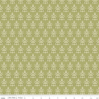 Glisten by Sandy Gervais (C16225-OLIVE) from 56-Riley Blake features small white floral motifs on light olive green cotton fabric, ideal for quilting, with a ruler in inches shown along the bottom edge.
