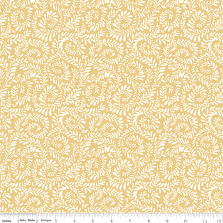 Riley Blake Sunflower Whispers by Lisa Audit Fabric C16672-YELLOW features a beige cotton with white leafy vines. 100% cotton from Fabric by Riley Blake. Ruler in image shows inches.