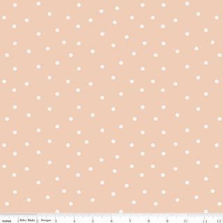 Riley Blake Sunflower Whispers by Lisa Audit Fabric C16673-BLUSH is a blush 100% cotton fabric with small white polka dots, featuring an inch ruler along the bottom edge. Brand: Fabric by Riley Blake.