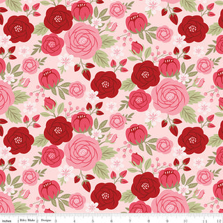 Sew in Love Dani Mogstad for RBD Blush Main Yardage C16900-BLUSH by Fabric by Riley Blake features seamless pink and red roses, green leaves, and small white flowers on light pink 44/45" wide cotton fabric with a ruler scale along the edge.