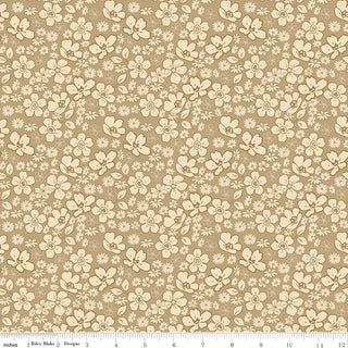Riley Blake Morning Latte Tonal Floral Camel C16923-CAMEL features a repeating cream floral pattern on beige. A ruler along the bottom shows measurements from 0 to 12 inches. Made from 100% cotton by Fabric by Riley Blake.