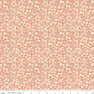 Riley Blake Morning Latte Tonal Floral Pink C16923-PINK fabric by Riley Blake features a repeating floral and leaf pattern in cream and orange tones, shown with a ruler displaying 0 to 12 inches. This yardage is made from 100% cotton.