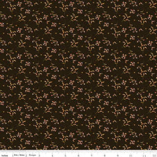 Riley Blake Morning Latte Berries Espresso C16925-ESPRESSO fabric by Fabric by Riley Blake features a dark brown background with small, light pink flowers and green vines. Made from 100% cotton, with a ruler at the bottom for scale.