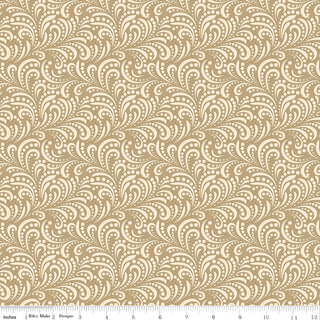A beige and white paisley-inspired design with dots, shown with an inch ruler for scale. Made from 100% cotton Riley Blake Morning Latte Swirls Camel C16928-CAMEL Fabric.