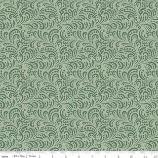 Riley Blake Morning Latte Swirls Green C16928-GREEN fabric yardage by Fabric by Riley Blake features green cotton with swirling vines and dots, plus an inch-marked ruler along the bottom edge. 100% cotton.