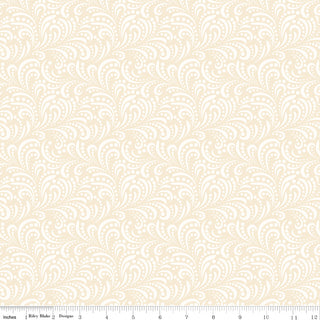 Riley Blake Morning Latte Swirls Latte C16928-LATTE Fabric Yardage features 100% cream cotton with a paisley-like swirl and dot pattern. Shown with ruler for scale. From the Morning Latte collection by Fabric by Riley Blake.