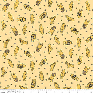 Echo Park for Riley Blake Designs Winnie the Pooh Toss Sunshine Fabric (C17002-SUNSHINE) by Riley Blake features yellow 1-yard fabric with bears holding honey pots, bees, and an inch ruler at the bottom.