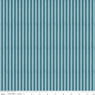 The 56-Riley Blake Kelsey Carlson Utah Stripes Teal C17022-TEAL fabric features vertical uneven teal and dark blue stripes. A ruler along the bottom edge shows measurements in inches from 0 to 12.