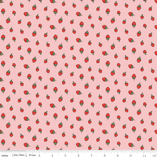The Serendipity 2 by Minki Kim C17302-PINK Strawberries Pink Fabric Yardage from Riley Blake features a pink background with small red strawberries and a white scale ruler, perfect for nostalgic projects and quilting enthusiasts.