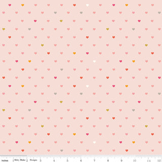 Enjoy Serendipity 2 by Minki Kim C17305-BLUSH Hearts Blush Fabric Yardage from Fabric by Riley Blake—a pale pink fabric with multicolored hearts and a ruler along the edge, perfect for quilting and nostalgic print enthusiasts.