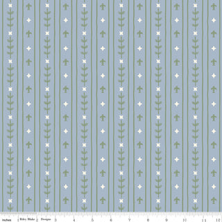Faraway Kingdom ROYAL STRIPE SKY C17433-SKY by 56-Riley Blake features green leafy vines and white diamonds on a blue background with thin white lines—ideal for quilting cotton. Ruler scale at bottom shows inches. Inspired by medieval legends.