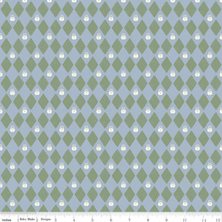 Faraway Kingdom HARLEQUIN PRINCE SKY C17434-SKY by 56-Riley Blake features a green and blue diamond pattern with white cat faces in each green diamond—ideal for storybook projects. A ruler at the bottom displays inch measurements.