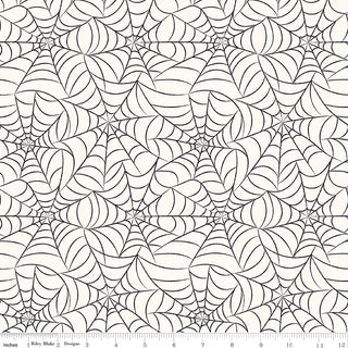 Frank and Friends WEBS CLOUD C17474-CLOUD by 56-Riley Blake features black spiderwebs on white in a repeating design. Shown with ruler for scale. Premium cotton quilting fabric, sold by the yard—great for your next monster mash project!.