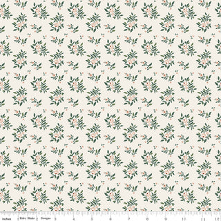 Danelys Sidron for RBD Before the Bloom C18065-CREAM Juniper Cream by 56-Riley Blake is a cream-colored cotton quilting fabric featuring a repeating pattern of small green leaves and tiny pink flowers, with a ruler showing measurements along the bottom edge.
