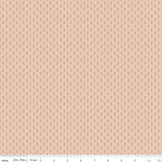 Danelys Sidron for RBD Before the Bloom C18066-BLUSH Mira Blush by 56-Riley Blake is a premium cotton fabric in a peach blush color, featuring a small, repeating red leaf pattern. Suitable as quilting fabric or by the yard, this fabric is displayed with a white ruler marked 0 to 12 inches along the bottom edge.