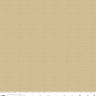 Danelys Sidron for RBD Before the Bloom C18066-TEADYE Mira Tea Dye by 56-Riley Blake features tan premium cotton fabric with a repeating small white floral pattern, shown with a ruler at the bottom indicating inches from 0 to 12—perfect for quilting fabric projects and available by the yard.