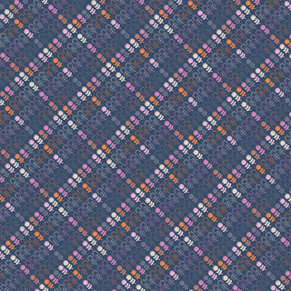 Diagonal rows of small, colorful plaid patterns form a diamond grid across the Cinnamon Toast cotton fabric, “Backyard Plaid CMT-62910” by Dana Willard for 69-Art Gallery Fabrics. This design is sold by the yard with free shipping available.