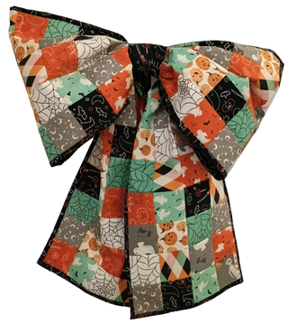 Join us for the Layton In-Store Class, “Big Bow Class LAYTON LOCATION” on Oct 1, 2026 from 2-5 pm with instructor Kathi, where you’ll create a large bow from patchwork fabric squares featuring Halloween-themed prints—pumpkins, ghosts, bats, and spiderwebs in orange, green, black, gray, and white. This project is ideal for beginners or as a festive accessory to make during the class at our Layton location.