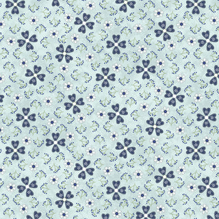 Bring your next creative project to life with Friendship Garden Gail Pan for HGF 3631-17 PINWHEEL FLOWERS Light Blue Fabric Yardage by 47-EE Schenck—featuring a light blue background adorned with a repeating pattern of dark blue and white five-petal flowers, petite white blossoms, and graceful green leafy branches—sold as high-quality cotton fabric by the yard.