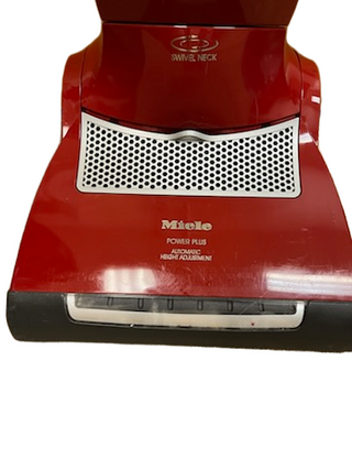Enhance your refurbished Miele Salsa Upright from Imagine Sewing & Vacuum with a red vacuum head, featuring "Swivel Neck," "Power Plus Automatic Height Adjustment," and new filters for better performance.
