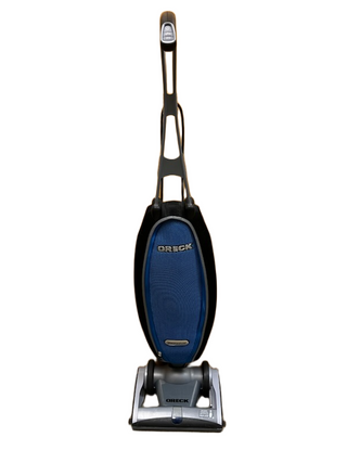 The Imagine Sewing & Vacuum Oreck Magnesium upright vacuum cleaner, in blue and black, stands on a white background and delivers reliable cleaning performance.