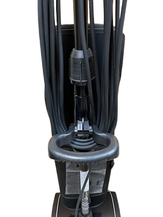Front view of the Oreck Elevate Control, a lightweight vacuum cleaner from Imagine Sewing & Vacuum, featuring a black handle and attached cord for easy commercial cleaning.