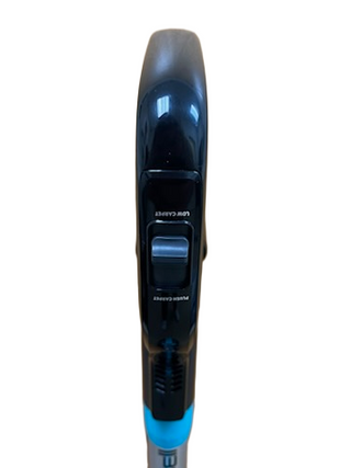 Close-up of Imagine Sewing & Vacuum’s Bissell MultiClean Allergen Lift-Off Pet handle with "Low Carpet" and "High Carpet" switch, plus a HEPA Sealed Allergen System for advanced cleaning.