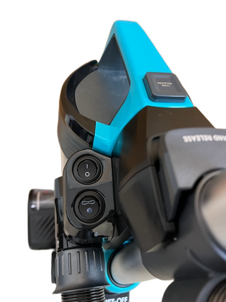 Close-up of a blue and black electronic device with screen, control buttons, and adjustment knobs on a tripod—offering precision like the Imagine Sewing & Vacuum Bissell MultiClean Allergen Lift-Off Pet vacuum.