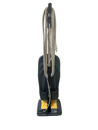 The Imagine Sewing & Vacuum Oreck XL Element upright vacuum, featuring a black and yellow base, gray dust bag, and wrapped power cord, is shown on a white background. This refurbished model provides reliable cleaning for thin carpets.