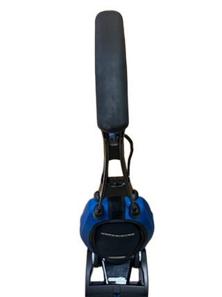 Top view of the Oreck Magnesium LW100 upright vacuum cleaner by Imagine Sewing & Vacuum, featuring a blue and black design, black handle, and never ending belt against a white background.