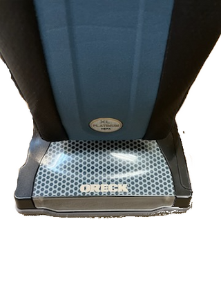 Close-up of the base of the lightweight Imagine Sewing & Vacuum Oreck XL Platinum upright vacuum cleaner in blue and gray.