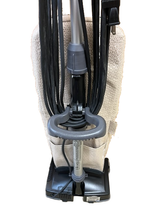 Refurbished Oreck XL21 upright vacuum by Imagine Sewing & Vacuum, features fabric dust bag, handle, power cord, and black base. Reliable on most flooring types; shown from the front.