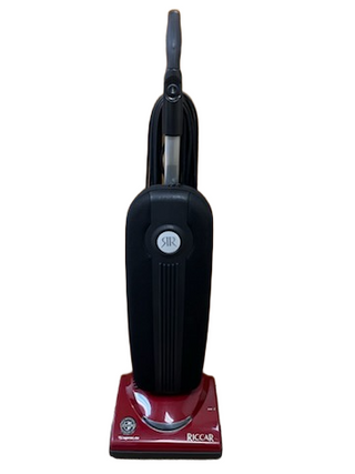 A refurbished Riccar R10P vacuum cleaner from Imagine Sewing & Vacuum, featuring a lightweight design in bold red and black, is displayed standing upright against a white background.