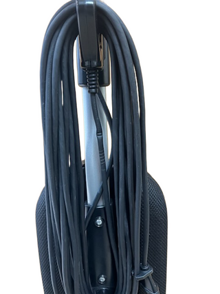 A close-up of the handle of the Riccar R10P vacuum cleaner by Imagine Sewing & Vacuum, featuring its power cord neatly wrapped around the cord hooks.