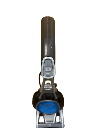 Top view of a handle with a gray button labeled “Low” and “High,” attached to an Imagine Sewing & Vacuum Oreck Magnesium refurbished vacuum featuring a blue section, isolated on a white background.