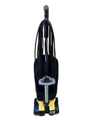 Rear view of an Oreck XL Gold two-speed vacuum cleaner with a yellow base and black bag, shown with the power cord coiled on the handle.