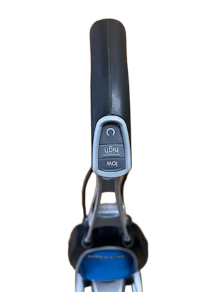 Upright Oreck Magnesium vacuum handle with a control panel featuring power, high, and low settings.