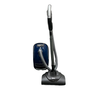 A certified refurbished vacuum, the Miele C3 Marin by Sew & Vac, featuring a blue and black canister with a silver handle and a flexible hose attachment, stands elegantly on a white background.