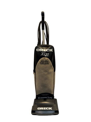 Refurbished Oreck XL21 Upright Vacuum by Imagine Sewing & Vacuum features a gray/black body, "Hypo-Allergenic" and "Xtended Life" labels, and comes with a new bag plus some used parts for reliable performance.