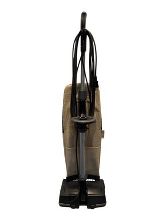 Refurbished Oreck XL21 vacuum cleaner by Imagine Sewing & Vacuum, featuring a beige fabric bag, black handle, and neatly wrapped cord, pictured on a white background.